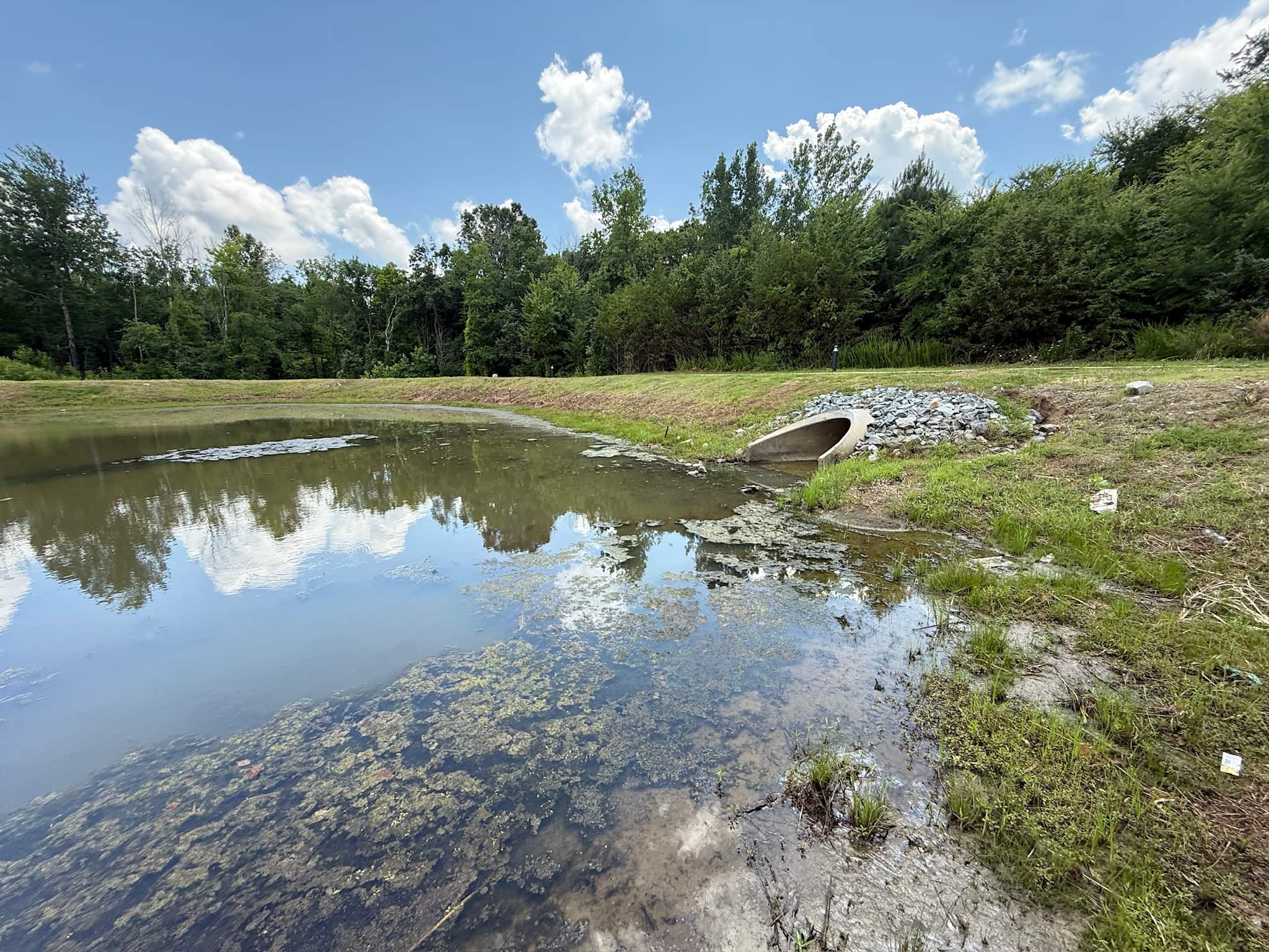 Sediment and debris removal from forebay, inlet, and outlet to restore flow paths