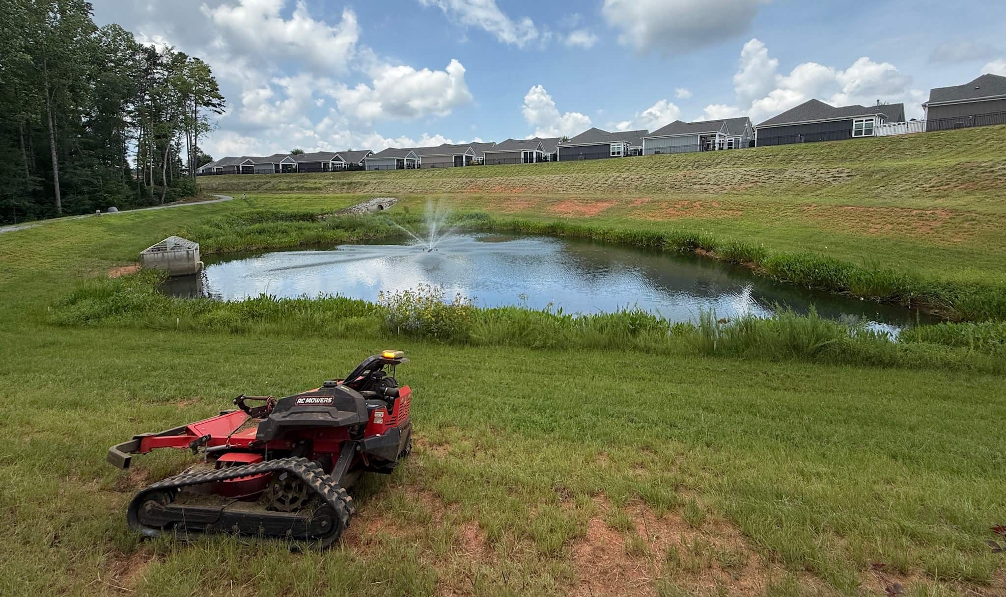 Team performing scheduled stormwater maintenance at a business park