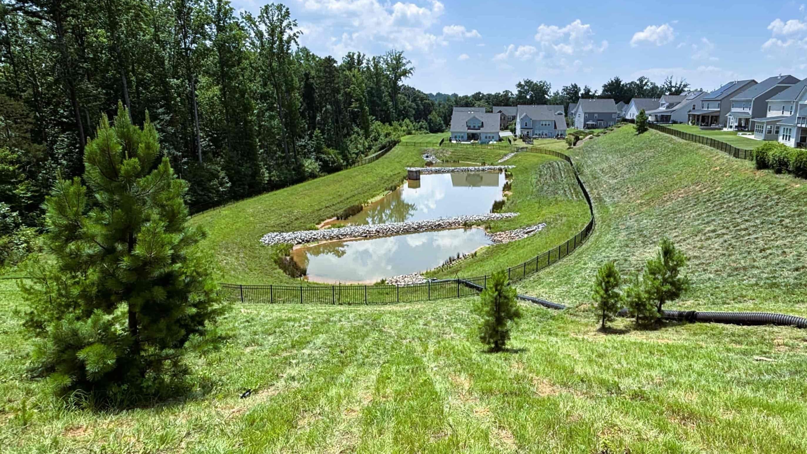 Amenity presentation around a stormwater pond with tidy edges and open sightlines